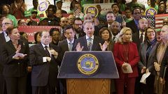 Image: Schneiderman speaks during a news conference