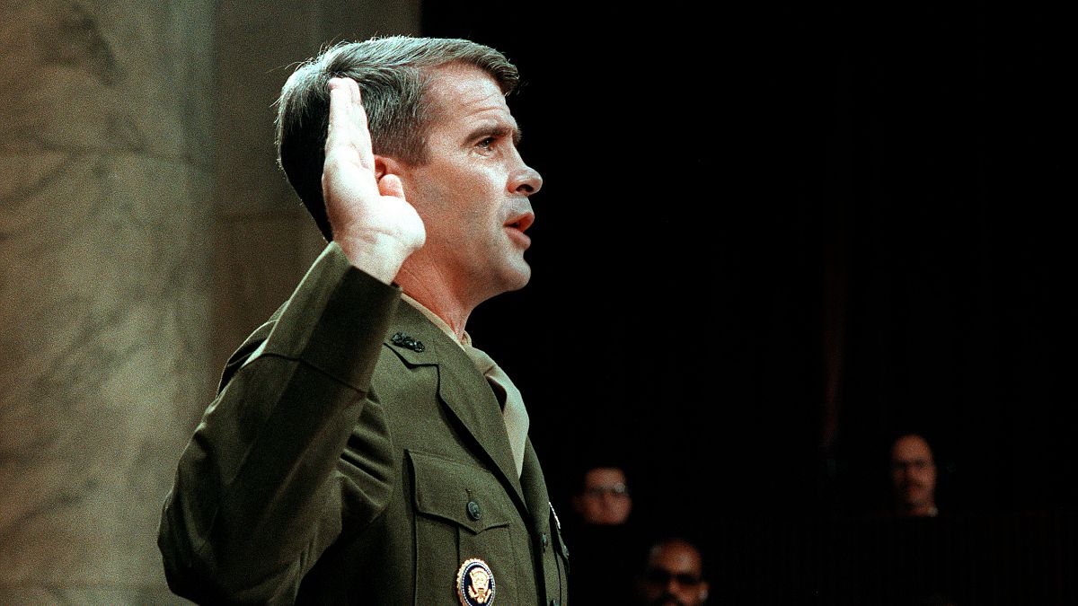 Image: Oliver North is sworn before the House and Senate Foreign Affairs Co