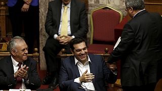 Tsipras beings 'race to reform' following Greek confidence vote