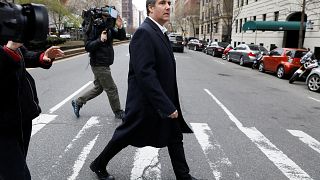 Image: U.S. President Donald Trump's personal lawyer Michael Cohen exits a 