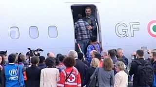 Los primeros refugiados que acoge la UE viajan de Italia a Suecia