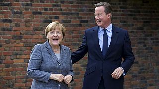 Cameron holds low-profile talks with Merkel