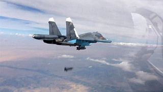 Putin adds diplomatic strand to bolster Syrian air strikes