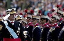Spain's King Felipe presides over national day parade