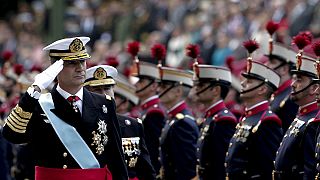 Spain's King Felipe presides over national day parade