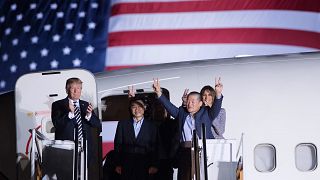 Image: Trump welcomes back Americans released by North Korea