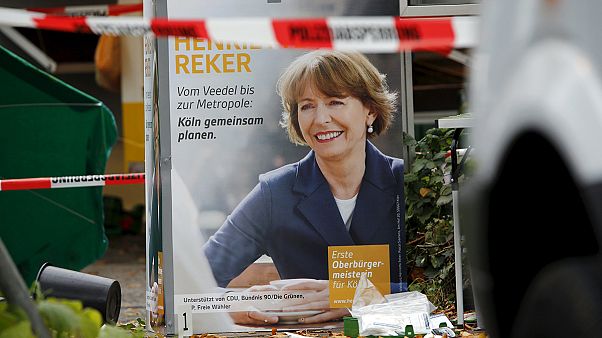 On eve of election, Cologne mayoral candidate stabbed in 'racist' attack On eve of election, Cologne mayoral candidate stabbed in 'racist' attack