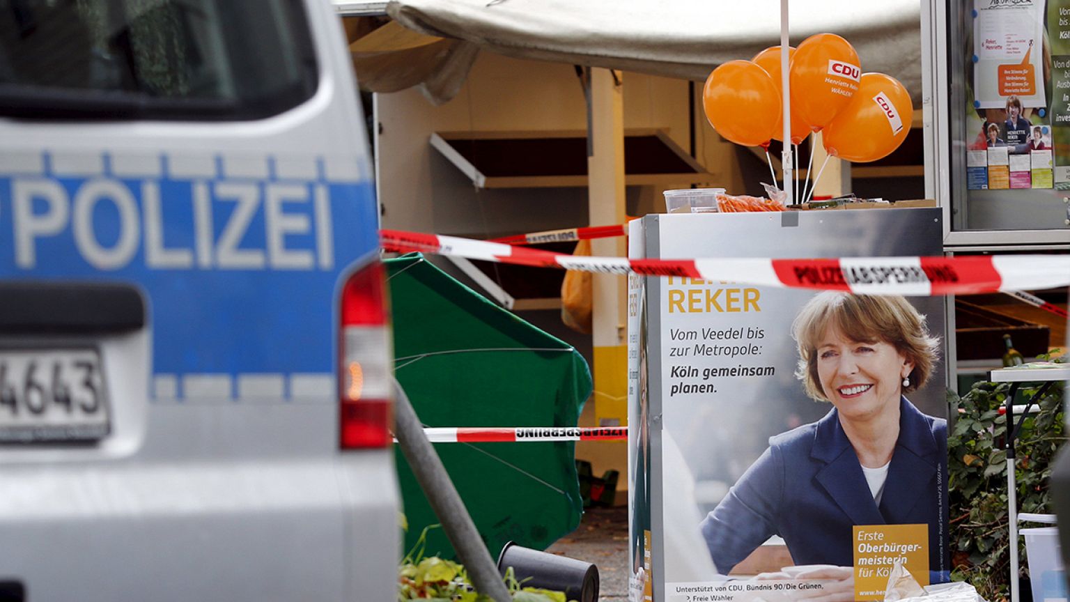 Germans rally to support mayoral candidate stabbed in 'anti-refugee attack'