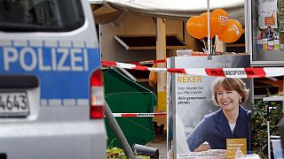 Germans rally to support mayoral candidate stabbed in 'anti-refugee attack'