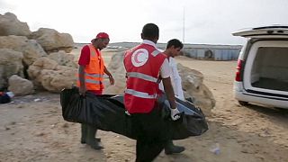 Hundreds of rescued migrants and refugees arrive in Cagliari