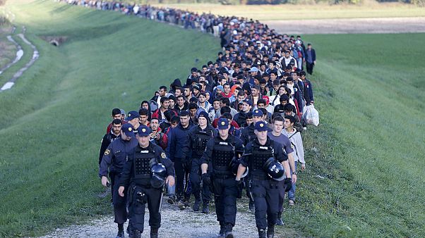 Slovenia appeals to EU for help as refugees overwhelm the country Slovenia appeals to EU for help as refugees overwhelm the country