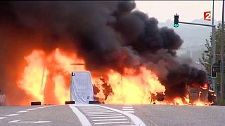 French travellers cut road and rail links near Grenoble to demand prison release for funeral