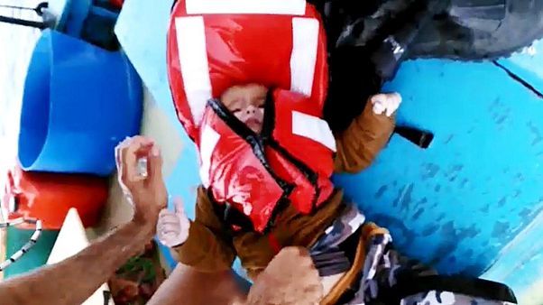 Baby rescued alive hours after migrant boat sinks in Aegean Sea Baby rescued alive hours after migrant boat sinks in Aegean Sea