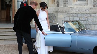 Prince Harry held the door for his bride.