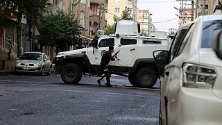 Two police, four suspected militants die in shootout in Turkey