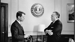 Image: RFK confers with FBI director J. Edgar Hoover in his office.