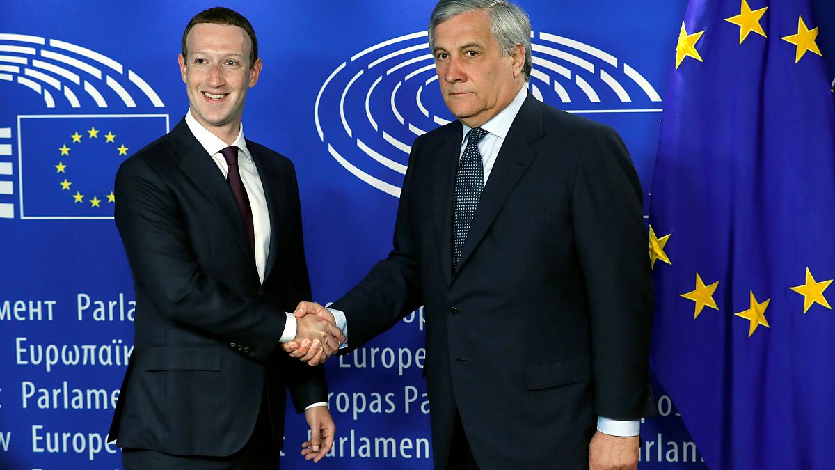 Image: Facebook's CEO Mark Zuckerberg shakes hands with European Parliament