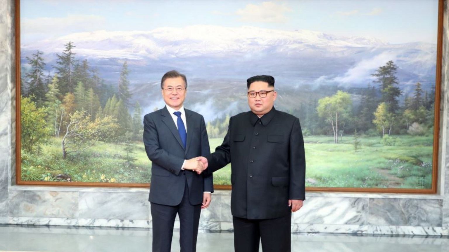 Korean leaders hold surprise second summit as Trump says Kim talks could go ahead