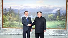 Korean leaders hold surprise second summit as Trump says Kim talks could go ahead