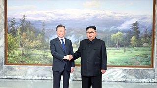 Korean leaders hold surprise second summit as Trump says Kim talks could go ahead