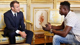 Image: French President Emmanuel Macron meets with Mamoudou Gassama, 22, fr