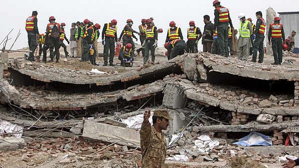 Search for survivors continues after Pakistan factory collapse Search for survivors continues after Pakistan factory collapse