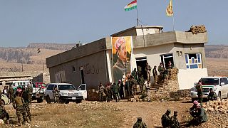 Kurdish forces battle ISIL for control of Sinjar