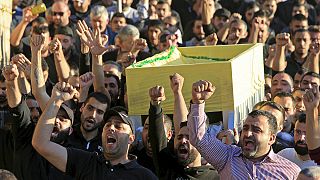 Funerals begin in Beirut as Lebanon's politicians appeal for unity