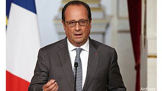 Paris attacks: François Hollande calls for unity and calm