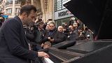 Imagine... street musician honour Paris dead