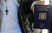 Questions asked over Syrian passport found by body of a Paris suicide bomber