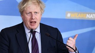 Image: British Foreign Secretary Johnson holds a joint news conference with