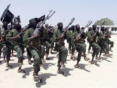 Hundreds of newly trained al-Shabab fighters perform military exercises.