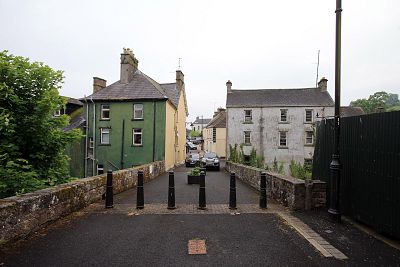 The view from County Fermanagh, Northern Ireland into County Donegal in the Irish Republic. The border, marked by small pillars, splits the small village of Pettigo in two.