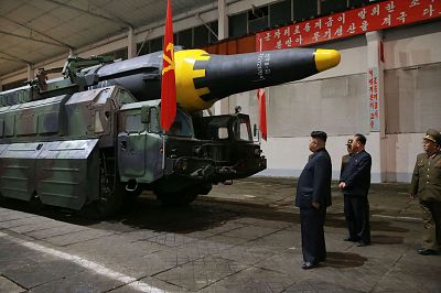 North Korean leader Kim Jong-Un inspects a Hwasong-12 ballistic rocket in 2017.