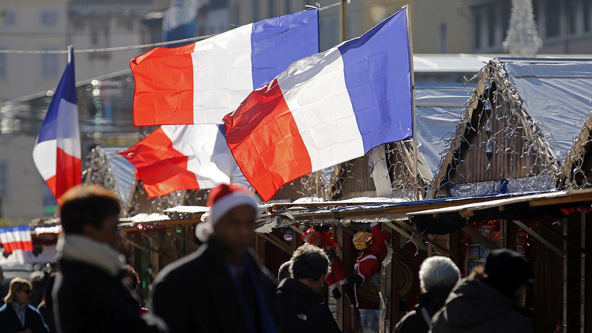 France's flag reminds shaken country what it stands for