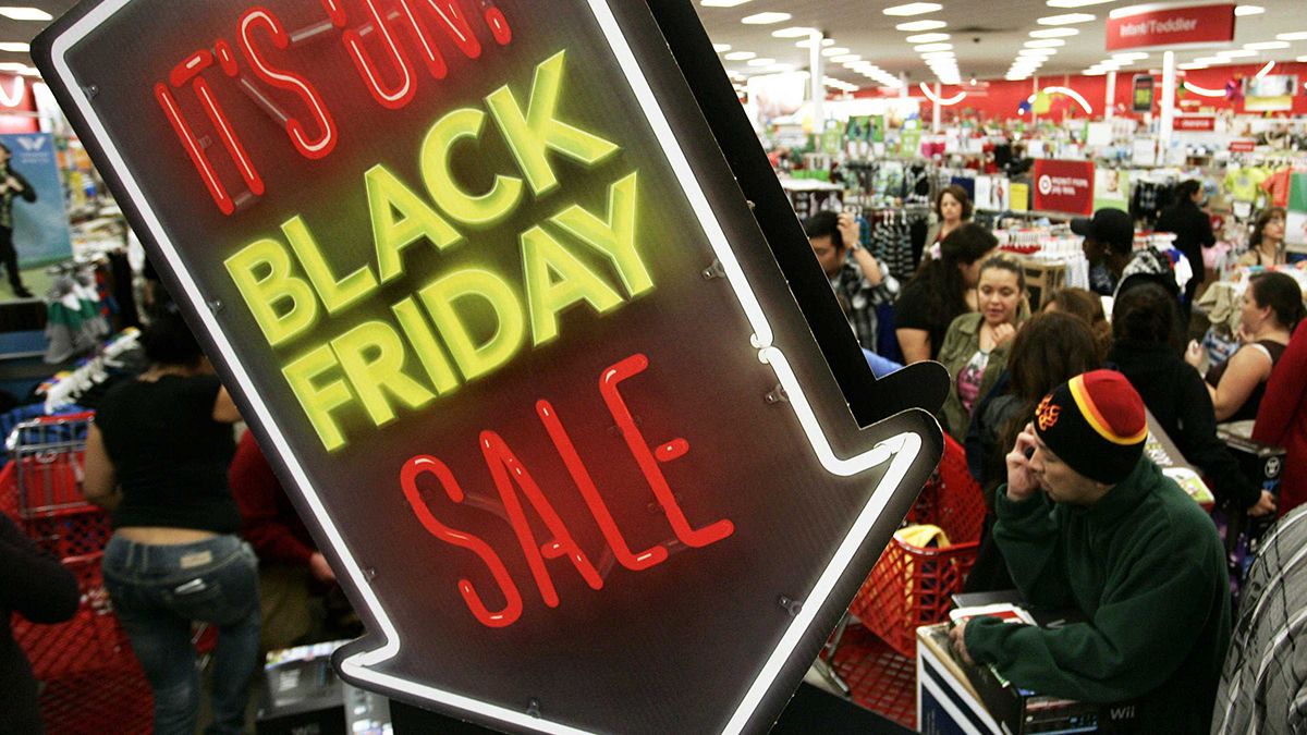 Black Friday in America: crowds in stores thin, but big at computers
