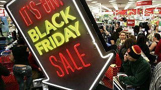 Black Friday in America: crowds in stores thin, but big at computers