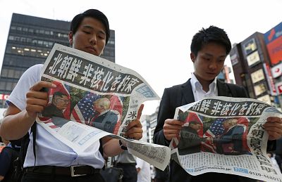 The headline of Japan\'s Mainichi Shimbun newspaper reads "North Korea promises to denuclearize" on Tuesday.