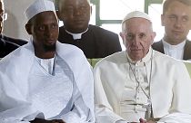 Pope Francis concludes Africa visit with prayers at Bangui mosque and open-air Mass