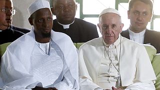 Pope Francis concludes Africa visit with prayers at Bangui mosque and open-air Mass