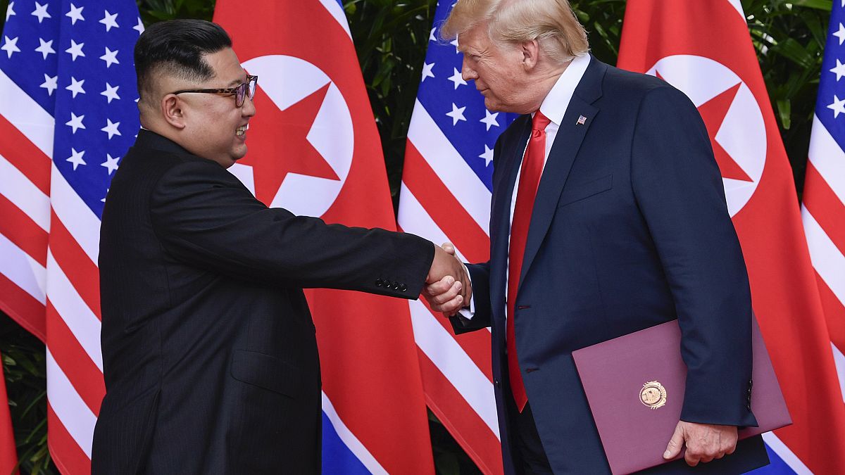Image: North Korea leader Kim Jong Un and U.S. President Donald Trump shake