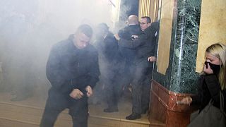 Tear gas protest hits Kosovo parliament ahead of Kerry visit