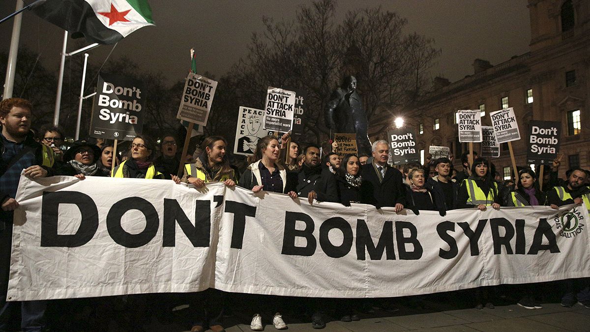 Protesters urge UK lawmakers not to back a 'bomb Syria' vote
