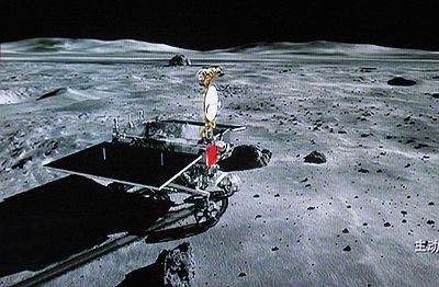 China\'s first moon rover "Yutu," or "Jade Rabbit," rolls away from the Chang\'e-3 lunar probe. The rover for the Chang\'e-4 mission has yet to be named. 