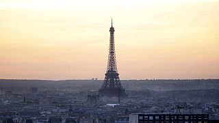 Bank of France cuts economic growth forecast, citing Paris attacks