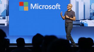 Image: Microsoft CEO Satya Nadella delivers the keynote address during the 