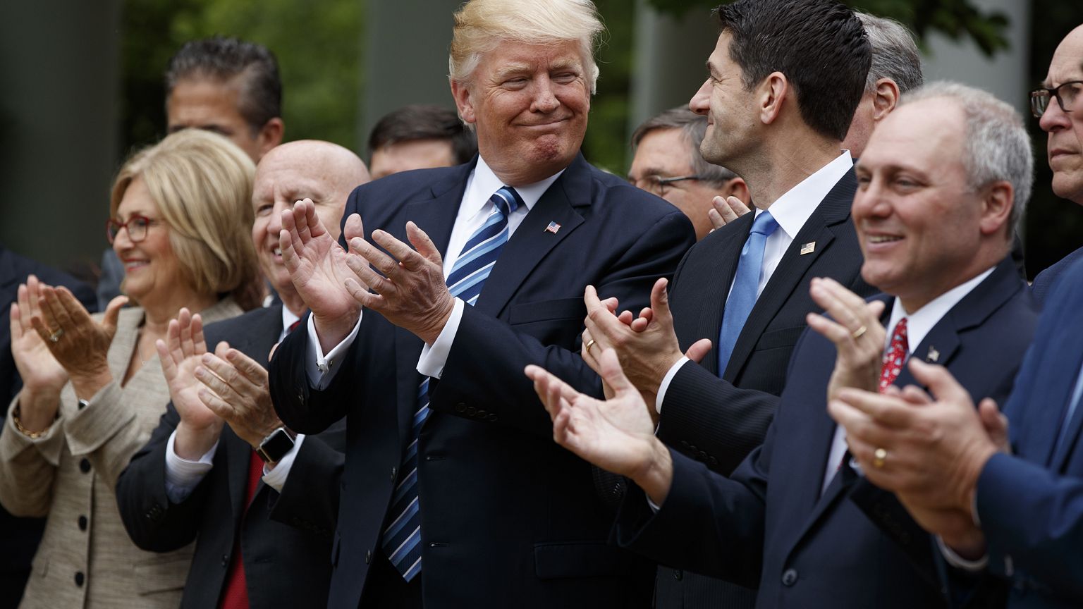 Image: Trump smiles at Rep. Paul Ryan