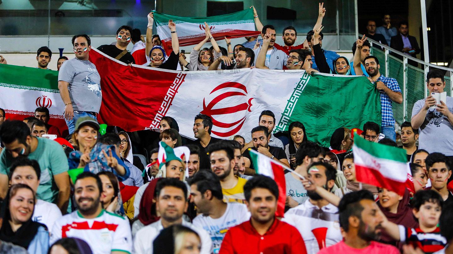 Barred from men's soccer games at home, Iranian women flock to World Cup in  Qatar