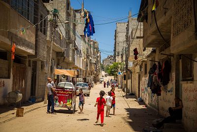 Children play in the street in Gaza City.